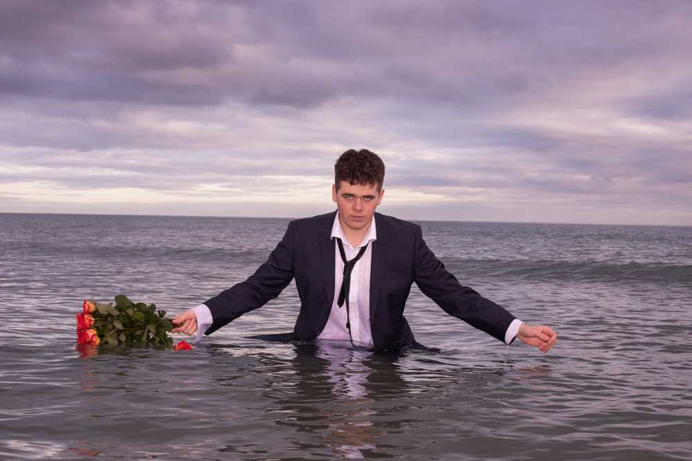 On Valentine's Day, this photo was captured on Hayling Island. The model in the water represents the pressure that society still places on men to support their partners financially whilst also being a modern men with modern views. 